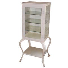 Early 1900s apothecary cabinet; queen anne-style legs
