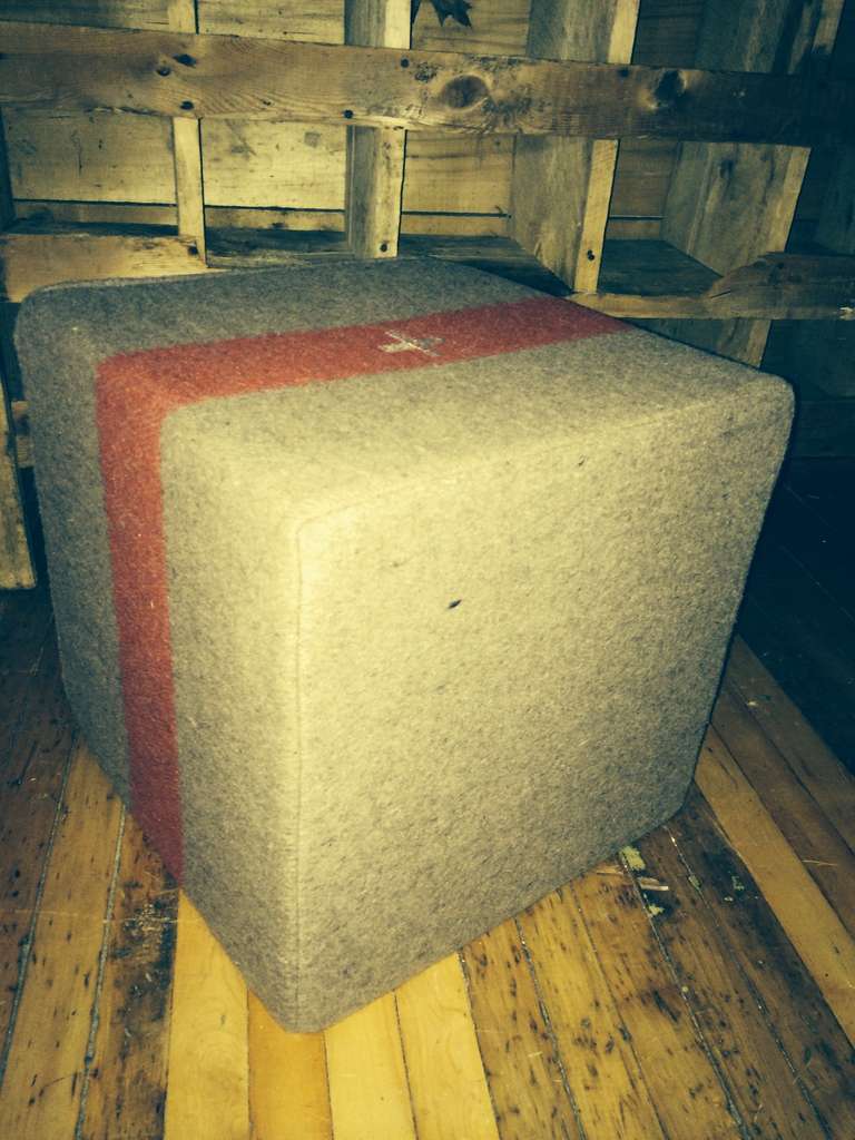 Industrial Swiss Army Blanket, (circa 1940s), as ottoman, footstool, pouf, seat