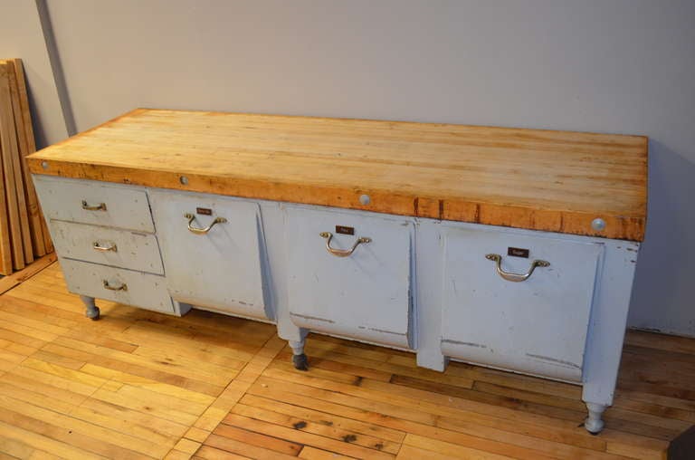 antique reclaimed workbench turned into a kitchen island