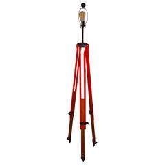 Surveyor Tripod in red/orange paint as adjustable Floor Lamp