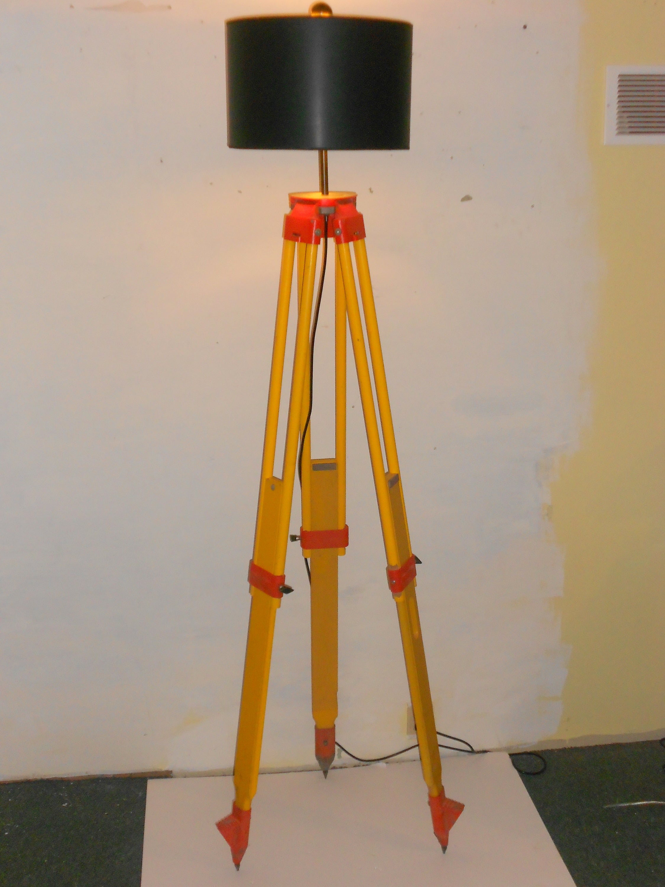 Surveyor's Tripod as Adjustable Floor Lamp