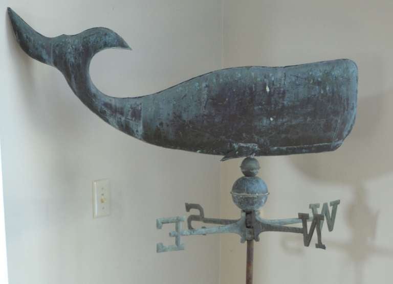 Weathervane of expressive copper whale with directionals. Whale of a weathervane pivots in the breeze, lets you know which way the wind blows.
With steel bracket for roof mounting or secure to bottom board for room display. In beautifully patinated