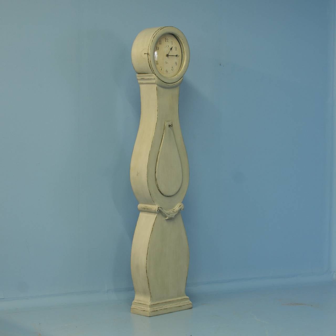 Gentle curves grace this Grandfather Clock from the famous region of Mora, Sweden.  The original clockworks can be restored or we will have a battery function installed for ease of use, we always leave the type of clockworks up to the individual