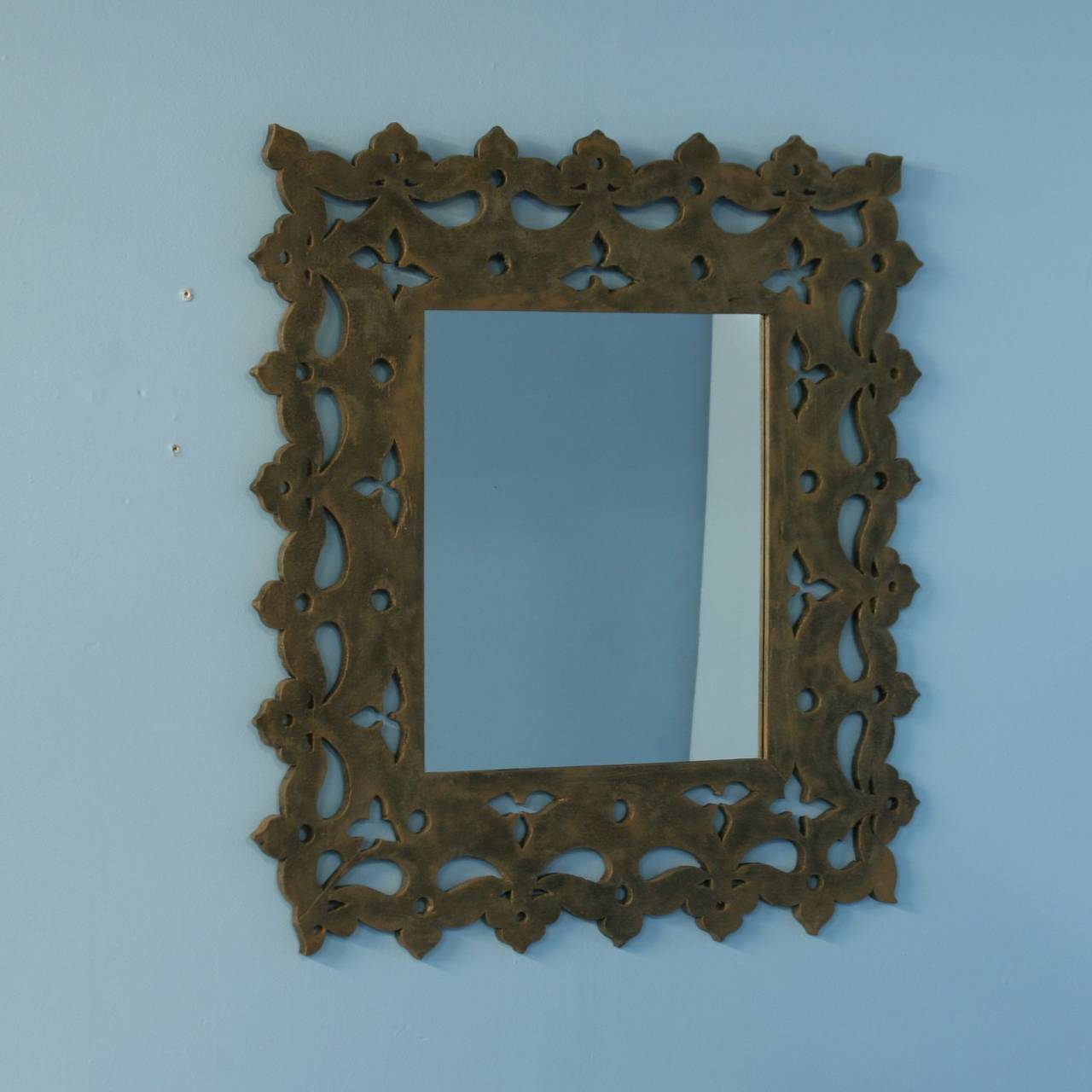This highly decorative and unique mirror was made from architectural elements (trim molding from old buildings). Note the unique, faded black paint. The natural distressing adds to the character and charm of this one of a kind mirror. It currently
