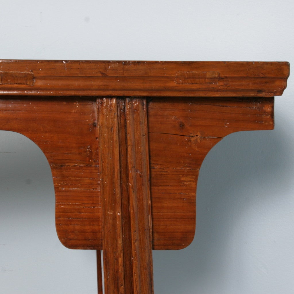 Antique Chinese Fruitwood Console Table, Circa 1840. This tall, narrow console table has a hand-polished lacquer finish, bringing out the natural beauty of the fruitwood. Please view the close up detail of the wood to appreciate what is immediately