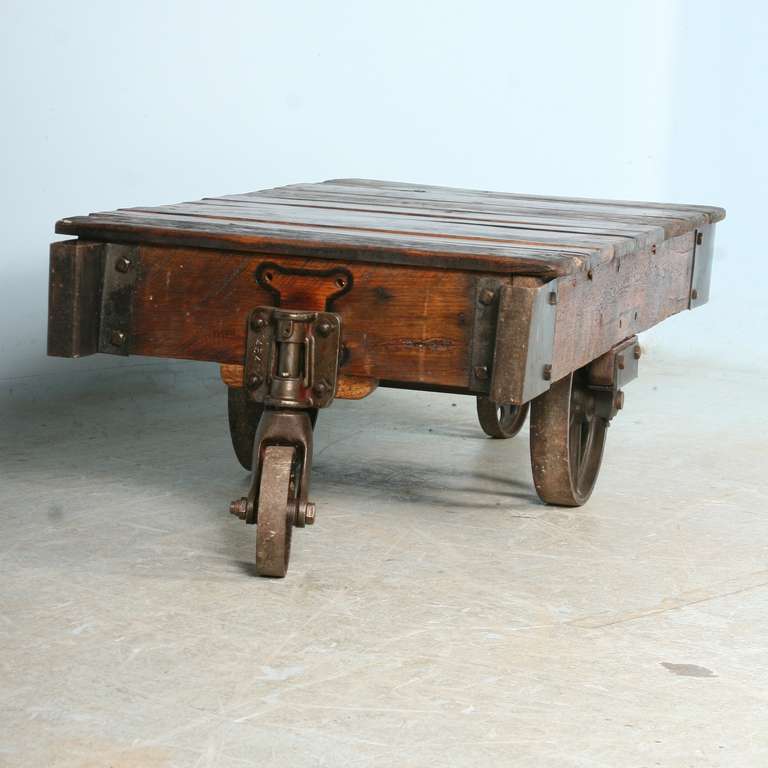 Antique Vintage Luggage Cart Coffee Table circa 1920 with Cast Iron Wheels In Excellent Condition In Round Top, TX