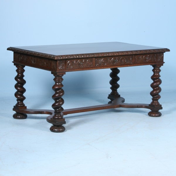 This magnificent Danish Dark Oak Carved Desk or writing table has a substantial 