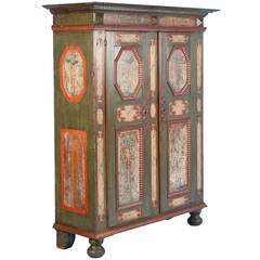 Grande armoire ancienne originale peinte en vert avec des silhouettes d'arbres:: vers 1760