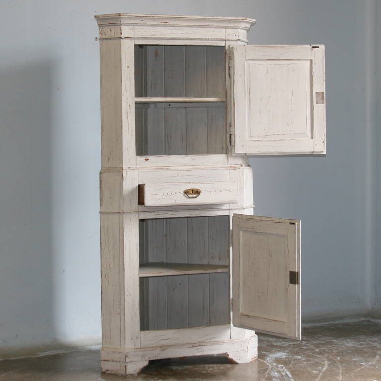 antique white cupboard