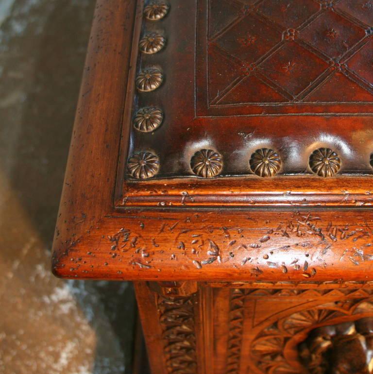 Antique German Heavily Carved Trunk with Embossed Leather Seat 1