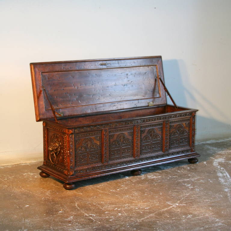 Antique German Heavily Carved Trunk with Embossed Leather Seat In Excellent Condition In Round Top, TX