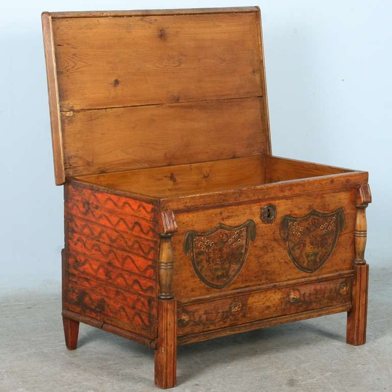 Lovely details abound in this delightful trunk/blanket chest from Romania. The paint is all original; the carved 