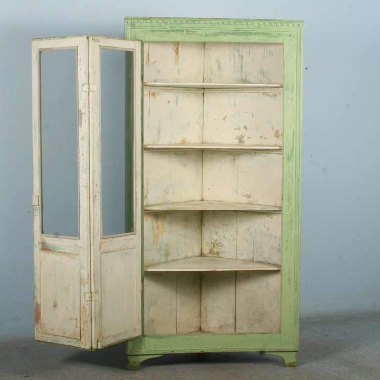 green corner cabinet