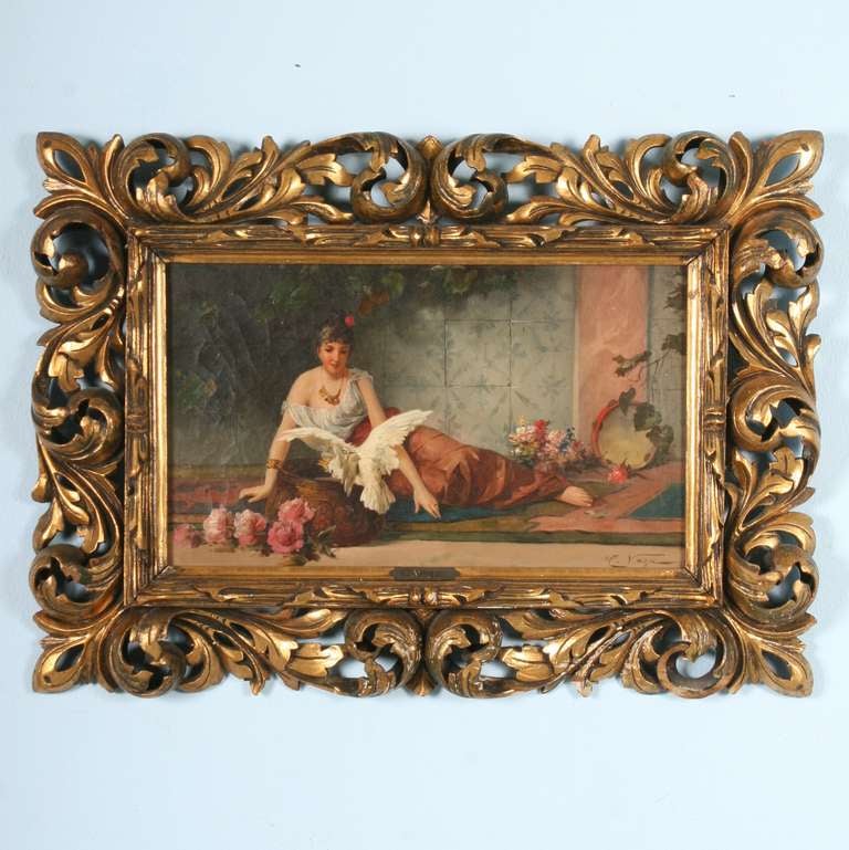 Young woman with dove and flowers, oil on canvas. Signed  
 C. Vega, approx. 1900. Richly carved frame. Minor age-related cracks.
