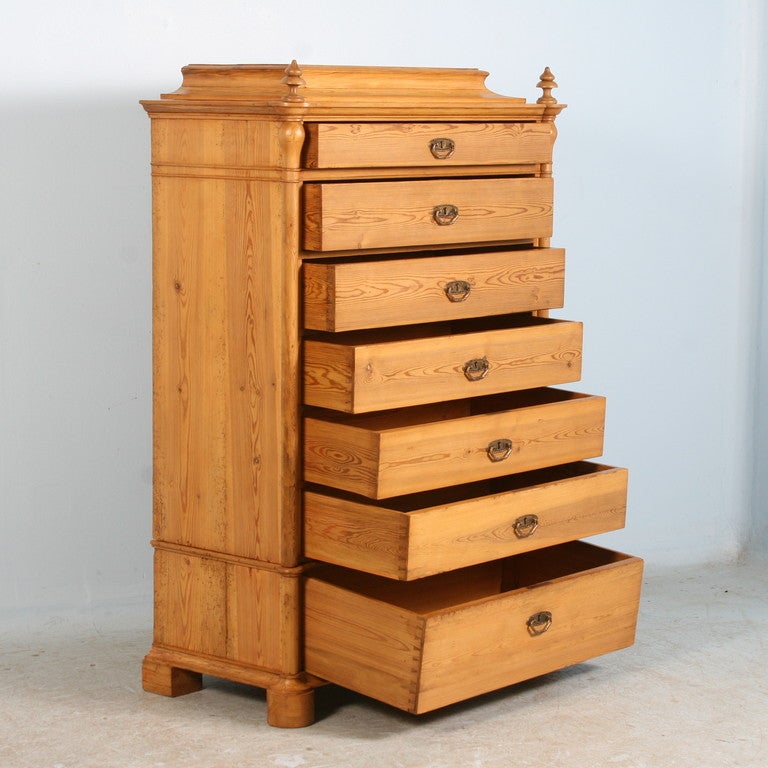 This extra tall pine highboy has 7 drawers. It is in excellent condition, very clean and ready for daily use.