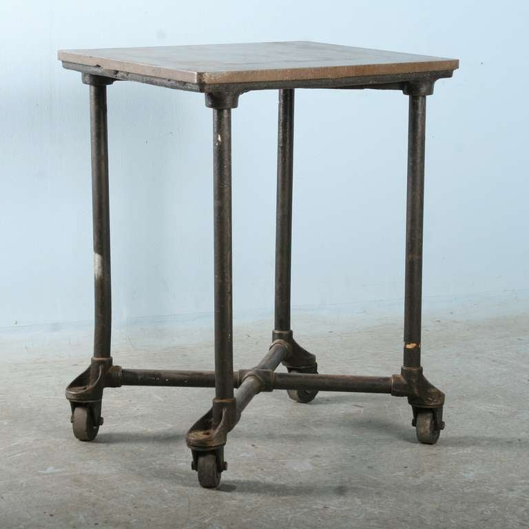 Great industrial table, will make a fun wine/drinking/bistro table. Top is 30.5
