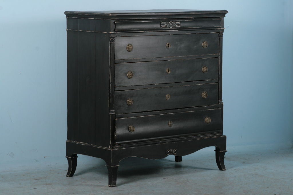 Antique Danish Black Distressed Tall Chest of Drawers Dresser c.1840. This amazing tall chest of drawers boasts four larger drawers for storage and a slender upper drawer on the top. It is substantial in 