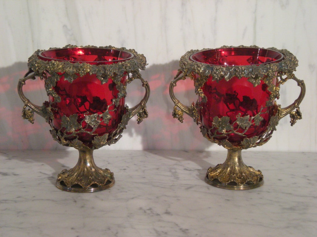 Exceptional red glass, lined coolers with gilt over silver. Sold as pair.