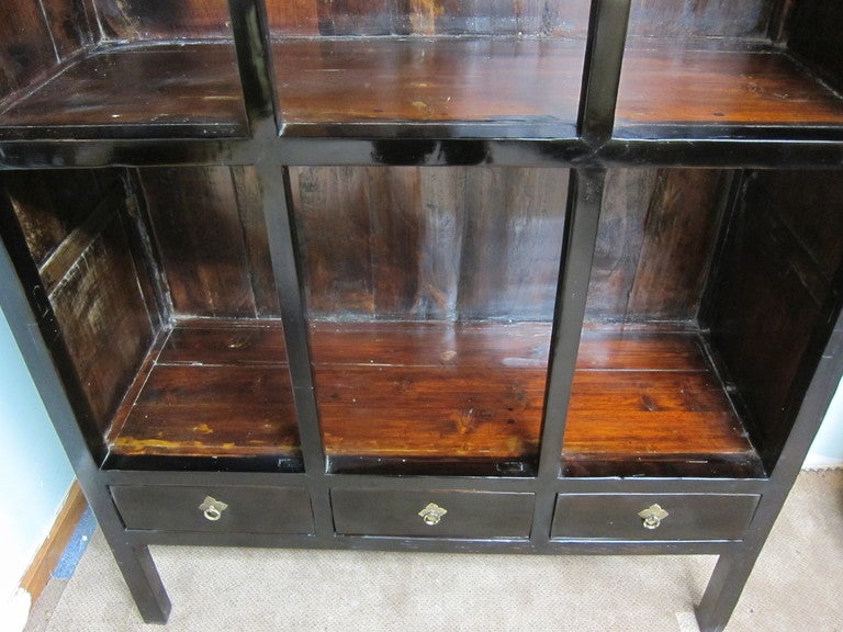 19th century Scholars display case, bookcase, with 3 lower drawers. 
Very good condition. Nice screen detail to the upper back. Black lacquer with worn elmwood interior.