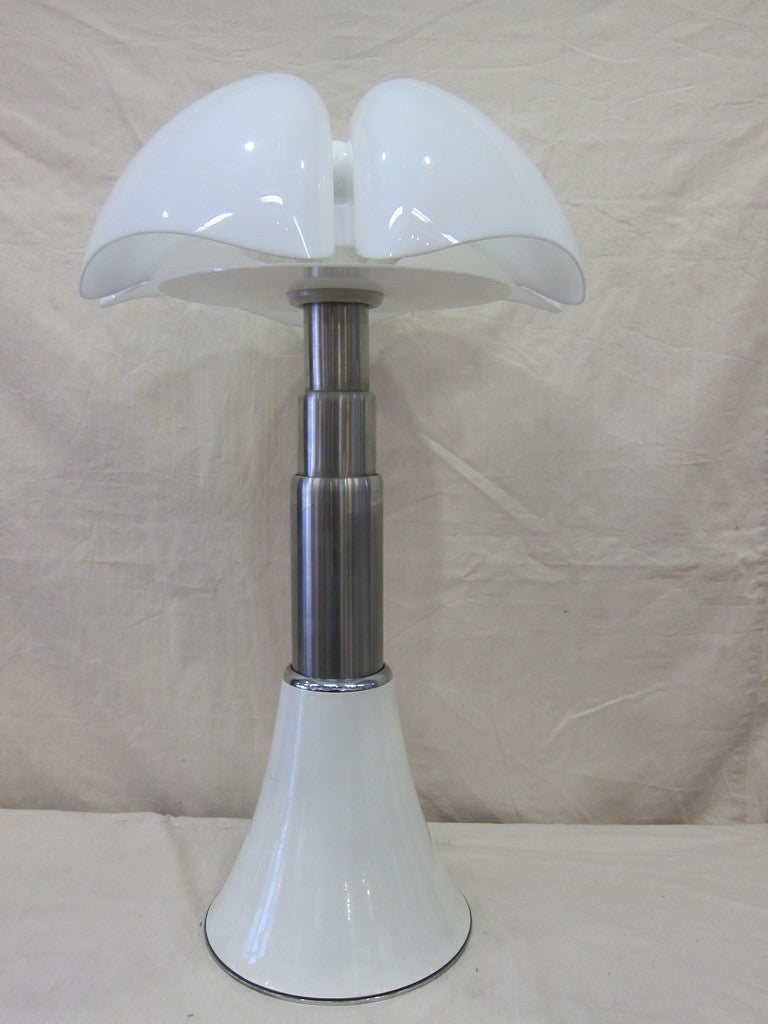 Pipistrello Lamp designed by Gae Aulenti (1927-2012) in 1966 for Martinelli Luce.  Our lamp is an early model and retains the original diffuser plate under shade.  Very good condition.  Base diameter 13 inch, shade diameter 21 inch, adjustable