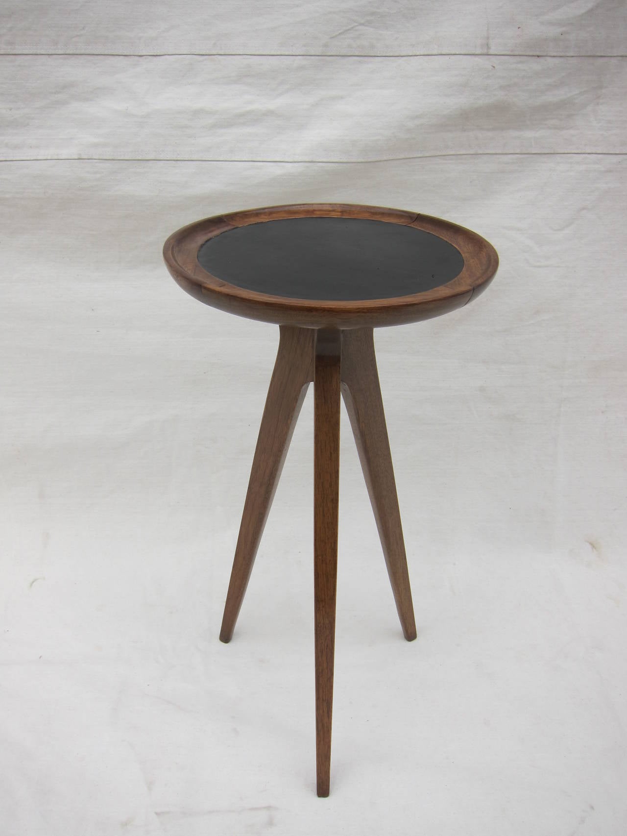 Tripod Leather Toped table by Jon Van Koert for Drexel. 
Very good condition.