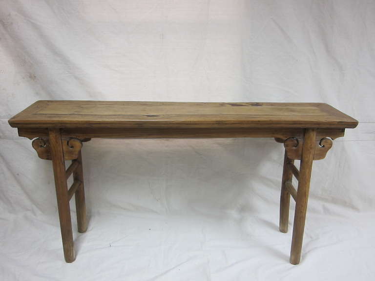 19th Century Chinese Altar Table.  Natural elm wood with strong patina. 
Carved Spandrels,