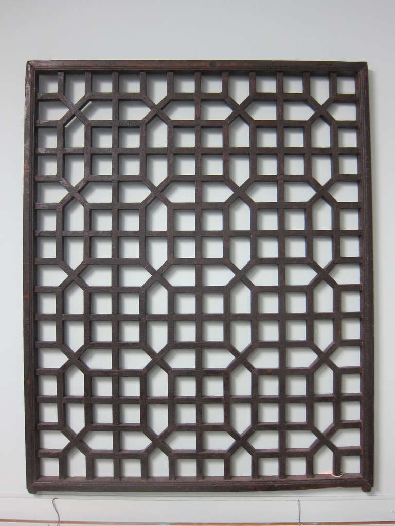 18th-19th century Lattice screen with interlocking Honeycomb design.
Condition is very good with heavy patina covering most of the wood. 