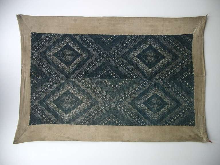 An exquisite Antique Laos Tribal Pha Hom Blanket.  Very Specific and with this age quite rare.  Pha Hom  blanket used for healing and comforting.  This Pha Hom Blanket is true to its origins beging natural cotton with indigo color.  The weave design