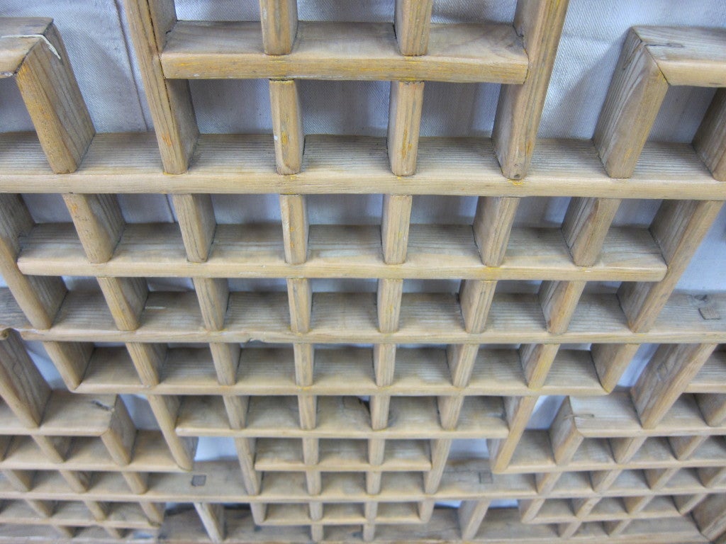 Large 19th century Chinese geometric window screen with impressive motive having a complex and intricate geometric design. Wonderful architectural element, circa 1850.
The camphor wood exhibits a warm soft hue and weathering to the wood. 
Condition