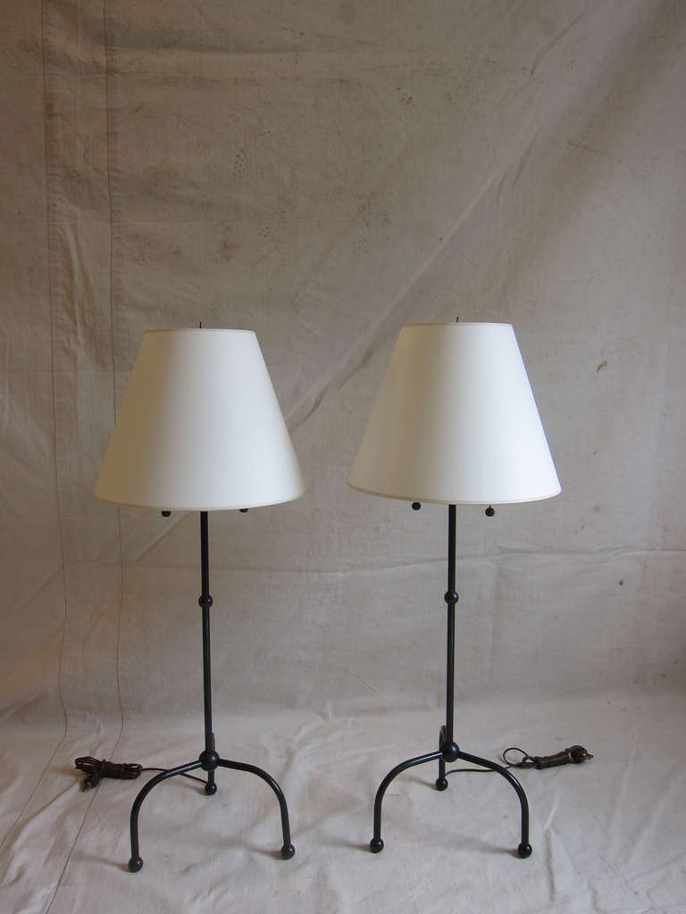 Pair of very special Brass Table Lamps in the style of Jean Royere. 
All brass with oiled finish,  excellent original condition with new Parchment shades.