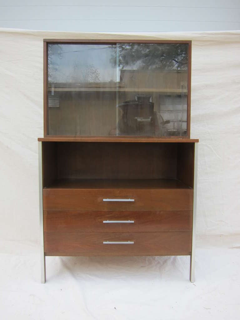 Paul McCobb For Calvin Buffet in walnut with Aluminum accents. Linear Group Chest of Drawers complete with display case top by Paul McCobb for Calvin Furniture, c. 1950s Great piece with lots of storage.  Was part of a complete dinning room set all