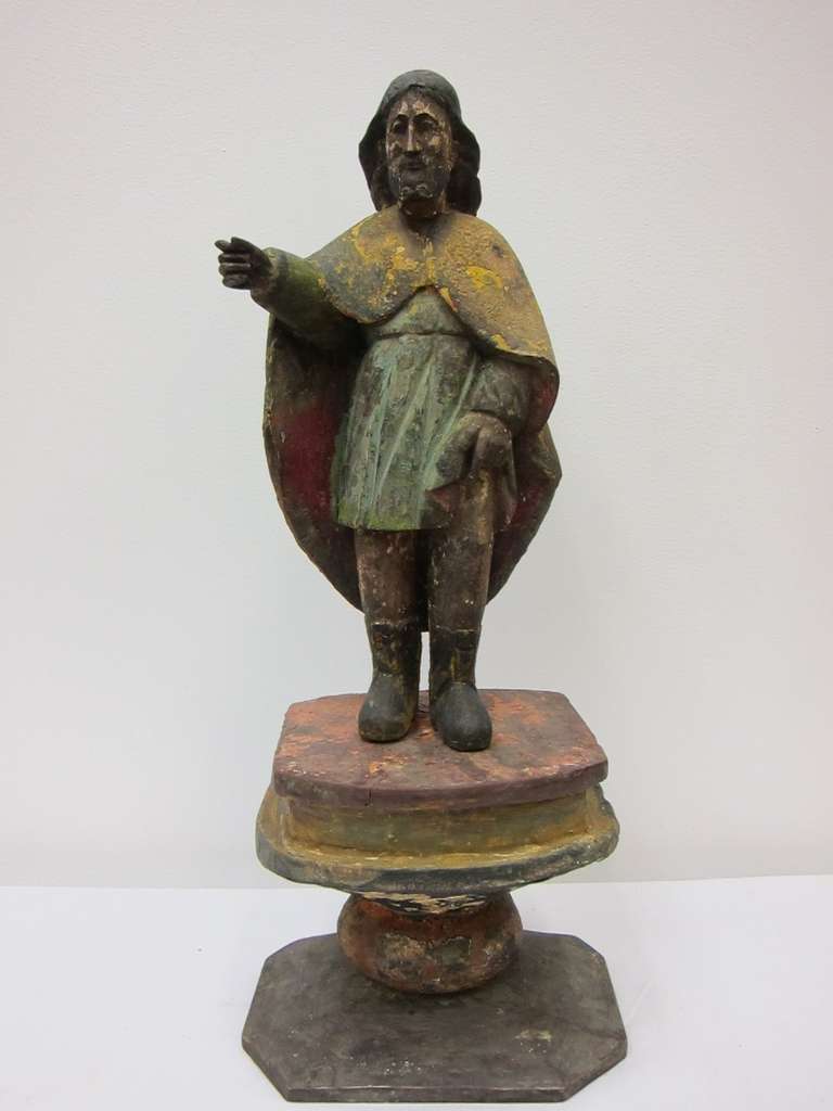 A 19th century Wood Block carving of St. Roch / St. Roque, from the Philippines. 
Very nice folk art piece.  Pigments on carved wood.