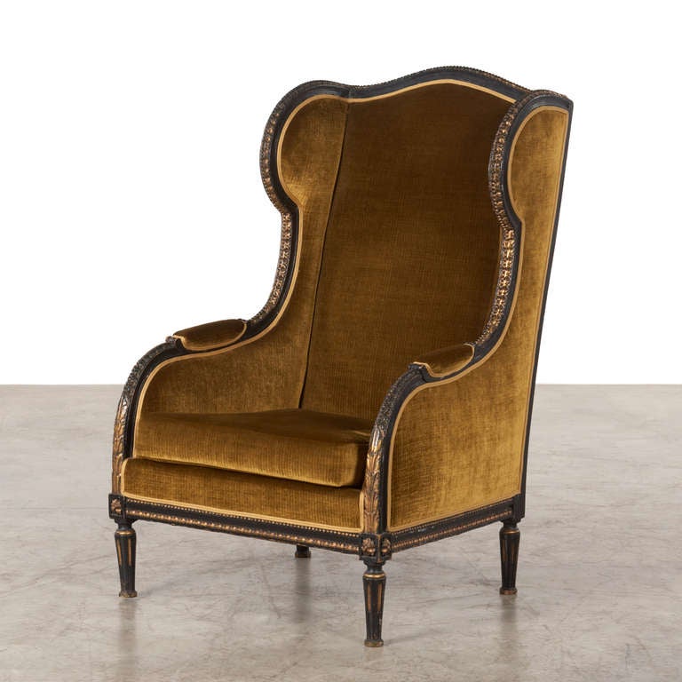 19th century French Louis XIV style armchair, 1860, carved walnut with the original black and gilded patina. Reupholstered with Carlucci fabric, velvet. Very good condition close to excellent condition.


