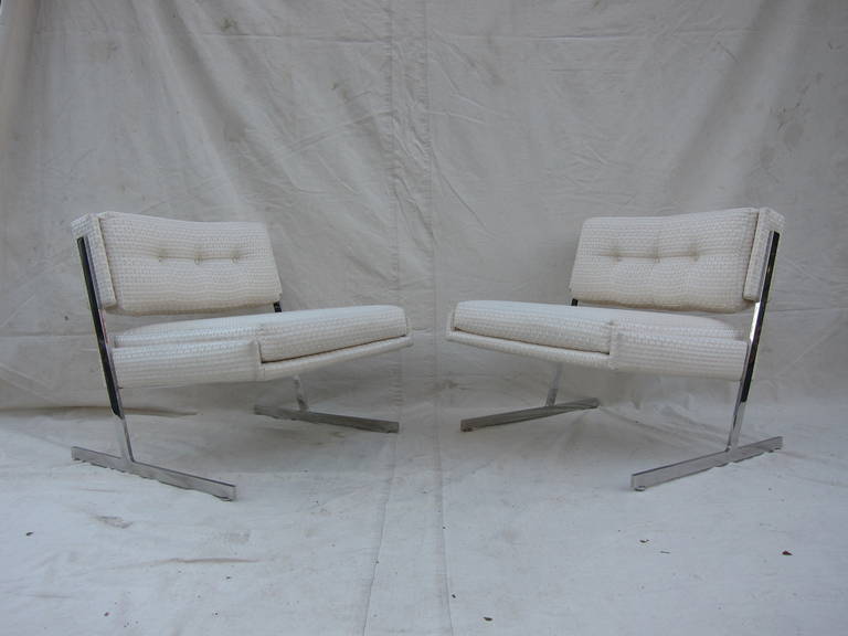 Dynamic pair of Harvey Probber cantilevered lounge slipper chairs. Extremely comfortable having a wide body with lots of room offering a prefect sitting position.  Cantilevered legs presenting a forward position that has a striking aesthetic