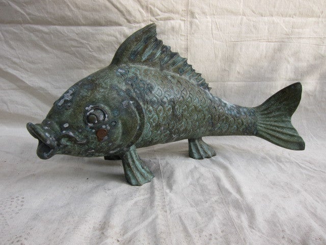 Bronze Sculpture of a walking Carp fish.  A symbol of  success, prosperity and the achievement of scoial status. Can be used inside or outside