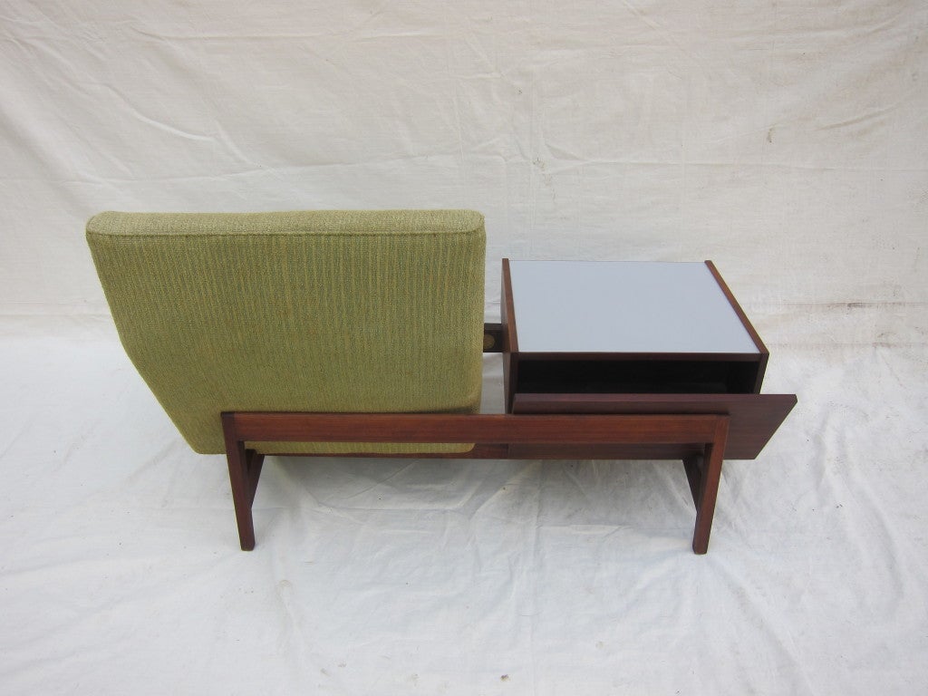 Jens Risom Tandem Seat and Table with angled magazine shelf.  Frame and table in excellent condition, needs updated upholstrery.  In house re-upholstrey available with customers own fabric, (COM requirement 3 yards).

