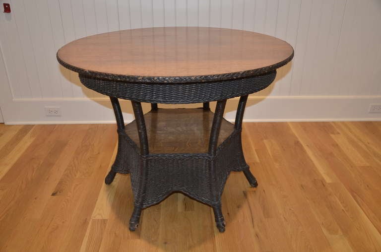 antique wicker table with oak top