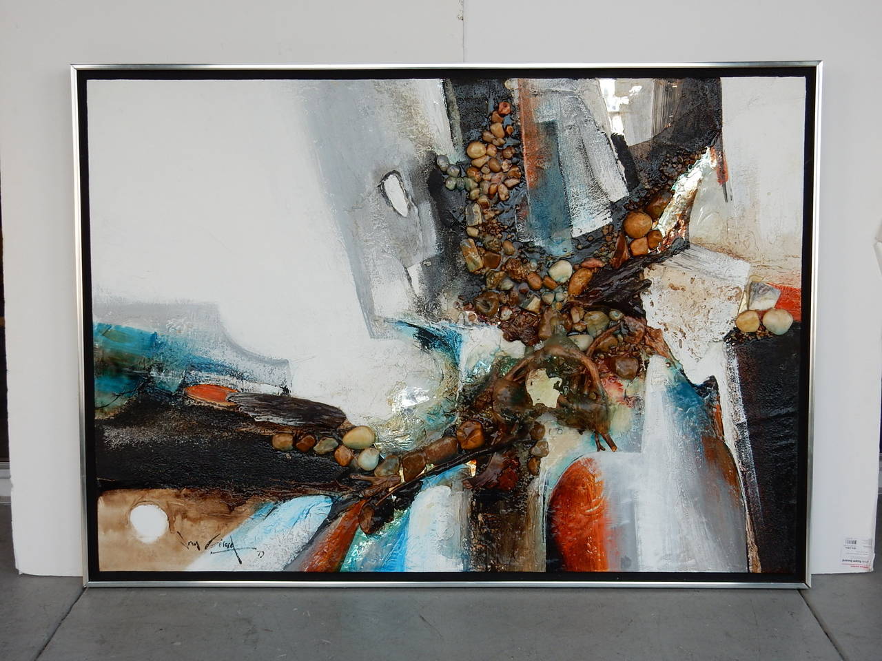 A very large and dynamic painting. Done in impasto and includes passages with rocks, woods and resin. Very interesting to say the least.