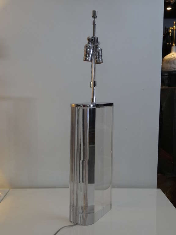 A large solid lucite lamp by Karl Springer. Nickel hardware. Base is 16.5