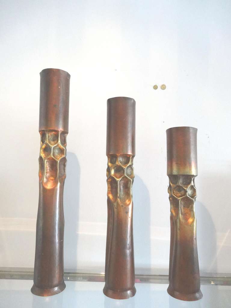Sculptural set of large candle holders. Hand hammered copper and beautiful patina. Signed by artist.