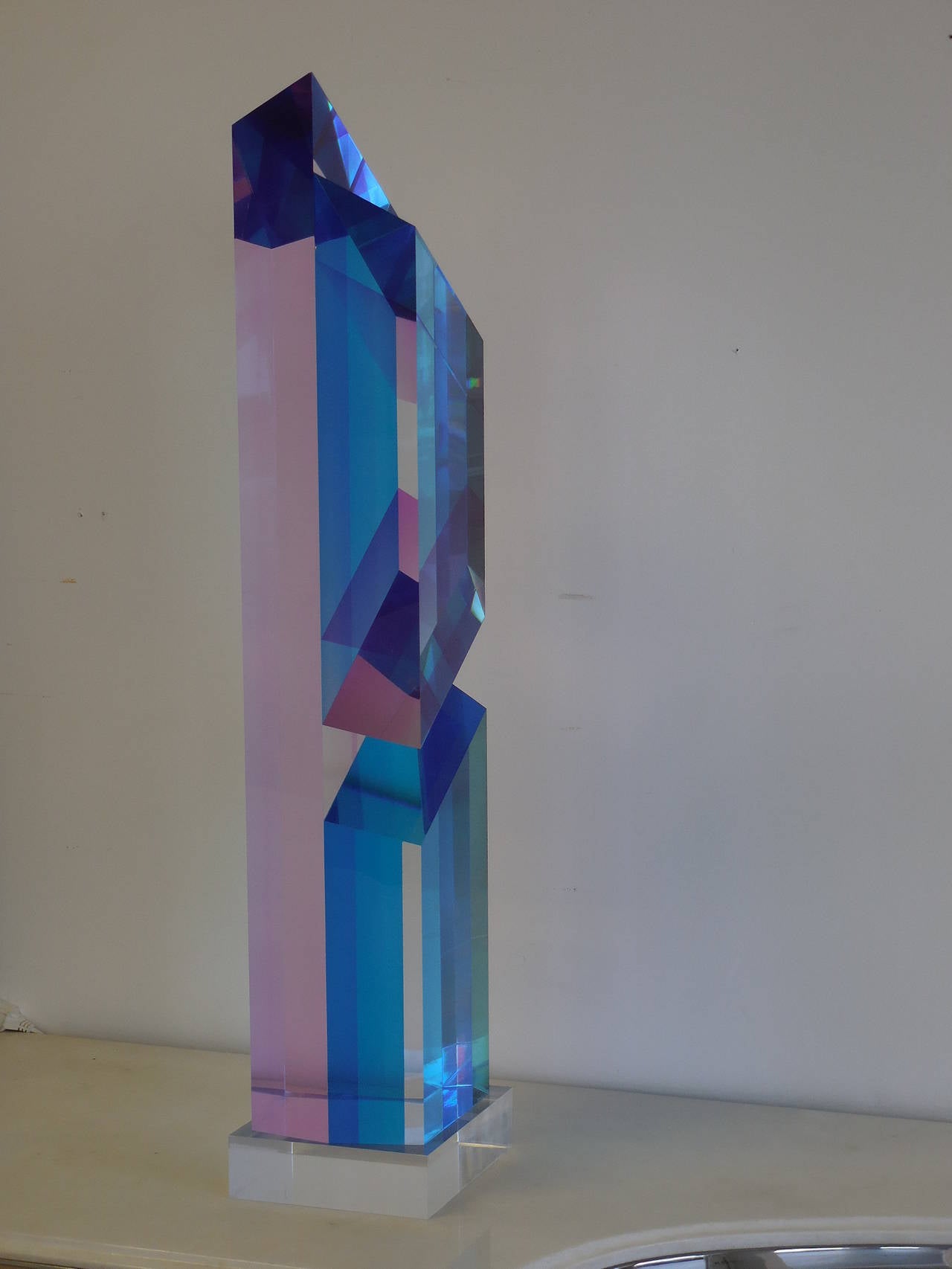 A very large Lucite sculpture. Colorful and interesting as lots of different optical effects are created. Signed and dated.