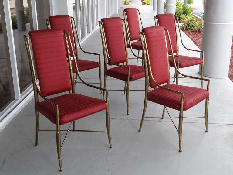 A set of 6 brass dining chairs by Mastercraft. Tall backs and graceful lines.