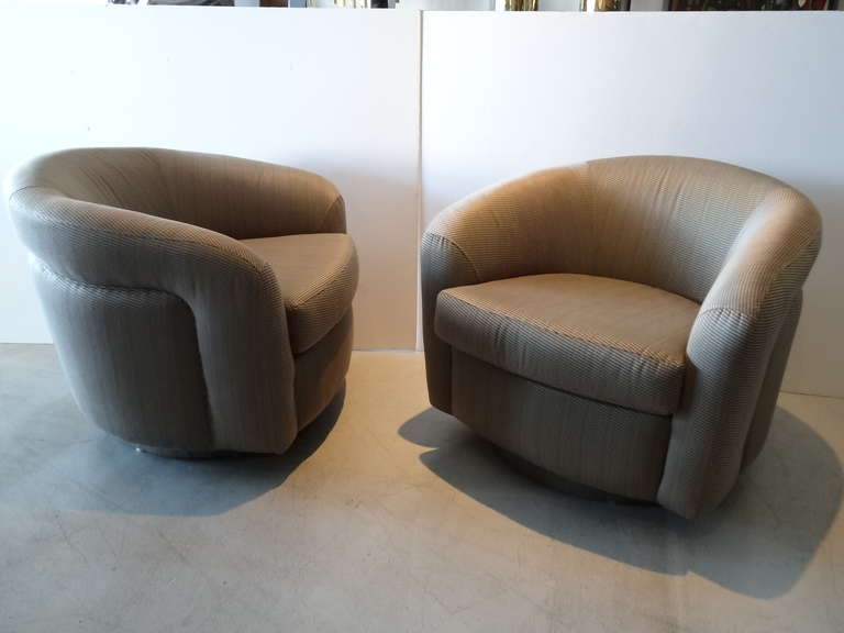 A very comfortable pair of swivel chairs. Great lines and design.