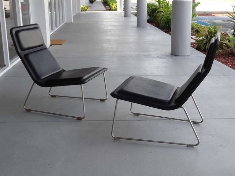 A pair of Jasper Morrison Low Pad Chairs. Black Leather and satin stainless frames. Super comfortable and great to look at. 