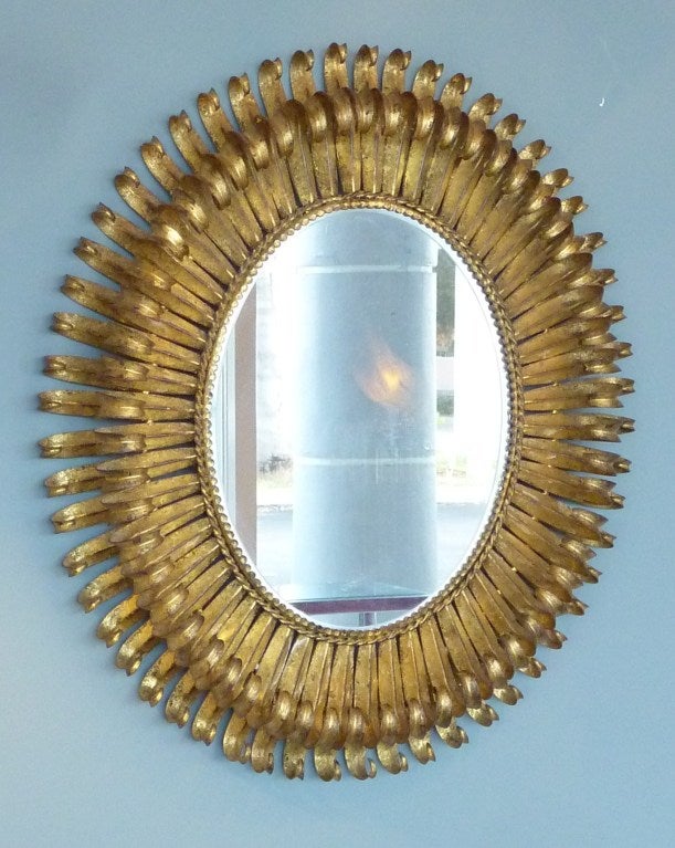 Striking mirror. Very tight design with lots of eyelashes on this mirror.