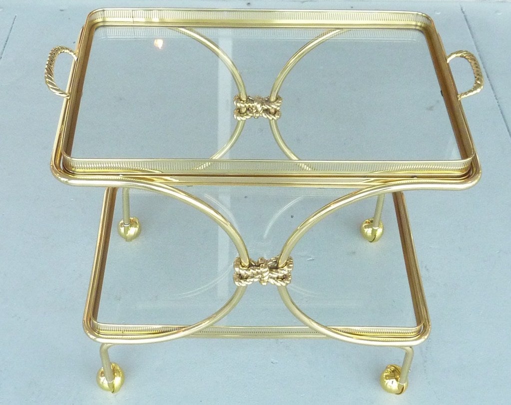 Exquisite brass bar cart with removable galley tray. Note the wonderful brass rope accents.