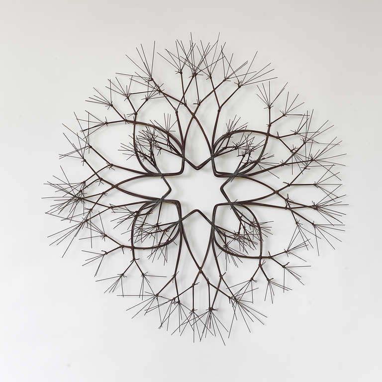 Ruth Asawa
Untitled (S.610)
circa 1966
Bronze wire

A great example of Asawa's tied-wire branch form. This piece mounts to the wall, with a Modern Eight-Pointed Star form with an Open-Center. Clean lines and etherial.
