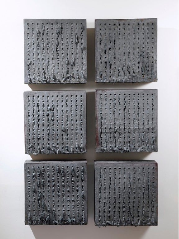 These 3D boxes mount easily to the wall, for great texture and depth.  Made of High fired Stoneware clay, each has melted steel nails which were placed in a  grid before firing.  Generally Matte surfaces with hints of metallic.