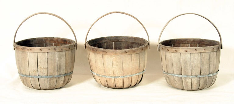 These baskets are wonderfully dual function: they can serve as decorative items as well as providing storage.  Fill them with seasonal favorites and display them on the porch or in kitchen.  Fill them with rolled up fluffy towels in the bath, or