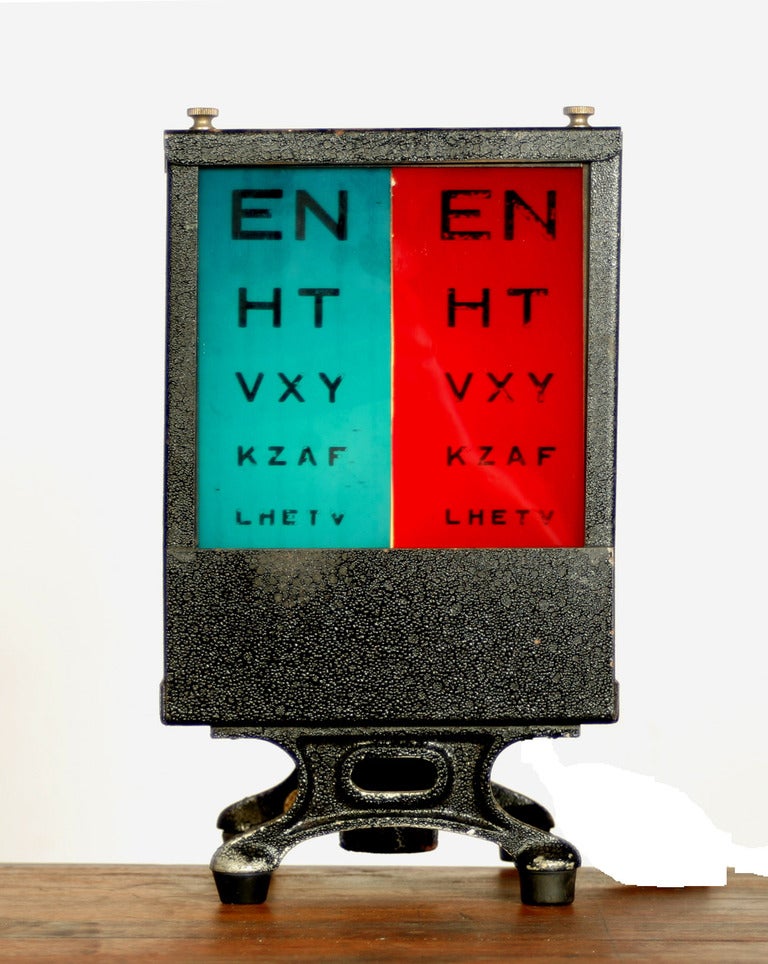 This lighted electric eye chart must have represented the cutting edge of technology in its day, threatening to relegate all those analog hanging paper charts to the scrap heap of history.  The case is made of a heavy gauge textured steel, with